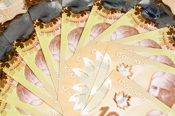 Loonie Dips After CPI Miss, Attention Turns to RBNZ